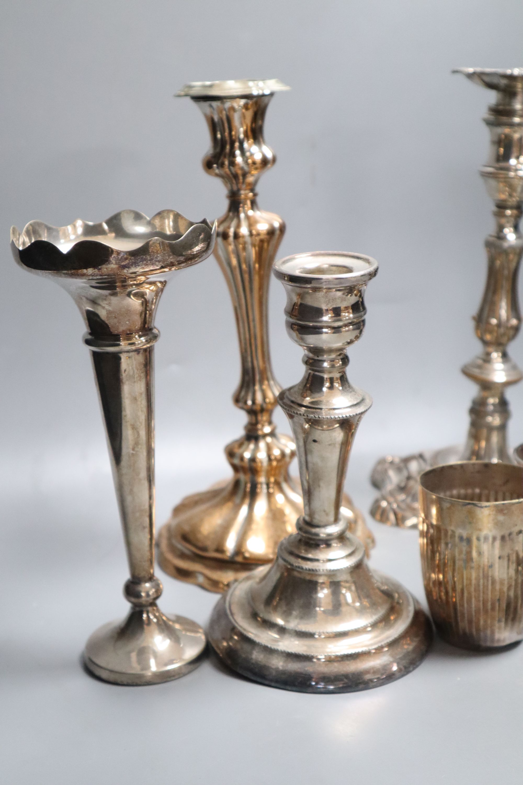 Assorted plated ware including candlesticks, trumpet vase etc.